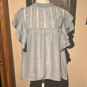 New with tags Elegant Blue Ruffle Sleeve Top size large